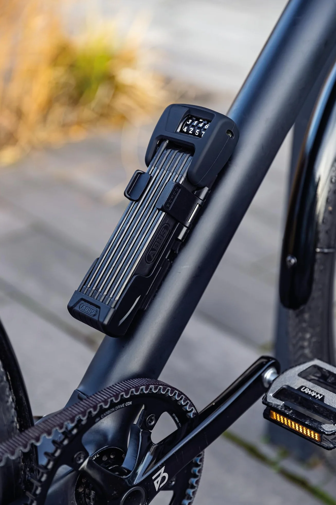 ABUS Bordo 6000C cerradura plegable con soporte Saddlefix y tapa de lluvia - cerradura de combinación de acero endurecido - con código de 4 dígitos - nivel de seguridad 10 - longitud 90 cm